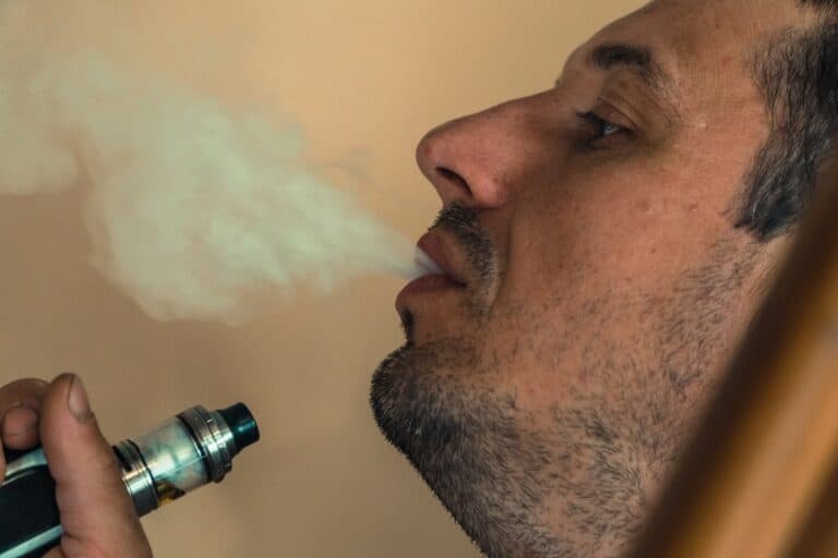 adult man vaping